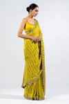 Vvani By Vani Vats_Green Satin Mirrors Round Neck Embellished Pre-draped Saree With Blouse _Online_at_Aza_Fashions