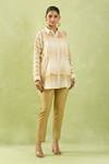 Shraddha Rambhia_Ivory Fine Chanderi Woven Stripe Collar Tunic_at_Aza_Fashions