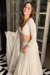 Buy Ritika Mirchandani White Net Embroidered Wed Design V Neck Paola Bridal Lehenga Set at Aza Fashions Buy_Ritika Mirchandani_White Net Embroidered Wed Design V Neck Paola Bridal Lehenga Set _at_Aza_Fashions