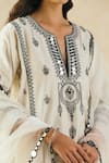 Sureena Chowdhri_White Silk Chanderi Embroidered Mirror Work Round Notched Kurta Set _at_Aza_Fashions