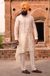 Buy_Nitesh Singh Chauhan_White Cotton Silk Hand Draped Asymmetric Kurta Set  _at_Aza_Fashions