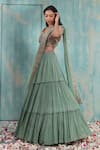 Smriti by Anju Agarwal_Green Blouse- Net And Taffeta Embroidery Mirror Work V Avni Tiered Lehenga Set _Online_at_Aza_Fashions
