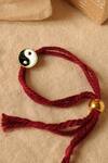 Buy_Aaree Accessories_Black Yin Yang Charm Rakhi_at_Aza_Fashions