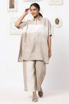 Buy Kaveri Beige Linen Embellishment Studs Collared Neck Top And Pant Set at Aza Fashions Buy_Kaveri_Beige Linen Embellishment Studs Collared Neck Top And Pant Set _at_Aza_Fashions