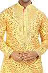 Nitesh Singh Chauhan_Yellow Cotton Silk Bandhani Print Kurta Pyjama Set_at_Aza_Fashions