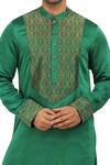 Nitesh Singh Chauhan_Green Linen Satin Asymmetric Kurta Set_at_Aza_Fashions