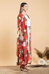 Divi By Sonal Khandelwal_Red Muslin, Cotton Boat Neck Wild Rose Print Cape And White Pant Set _at_Aza_Fashions