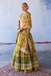 Shop_Archana Jaju_Yellow Pure Silk Embroidered Kalamkari V Neck Bridal Lehenga Set _at_Aza_Fashions