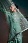 Anjali Kanwar_Green Net, Pure Georgette Sequin Mandarin Embroidered Kurta Draped Skirt Set _at_Aza_Fashions