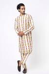 Buy_MR. Ajay Kumar_Beige Cotton Satin Floral Stripe Digital Print Kurta And Pant Set _at_Aza_Fashions