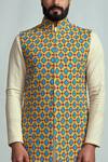 Buy Arjuun Kilachand Yellow Suiting Embroidered Bundi And Kurta Set Online at Aza Fashions Buy_Arjuun Kilachand_Yellow Suiting Embroidered Bundi And Kurta Set _Online_at_Aza_Fashions