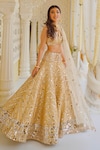 Buy_Abhinav Mishra_Gold Net Embellished Mirror V Neck Work Bridal Lehenga Set_at_Aza_Fashions