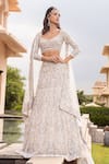 Buy_Amit GT_Beige Tulle Hand Embroidery Floral Jaal Pattern Tuluva Bridal Lehenga Set _at_Aza_Fashions