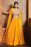 Buy_Aneesh Agarwaal_Yellow Soft Organza Embroidery Sequin Scoop Neck Placement Cape Lehenga Set_at_Aza_Fashions