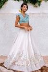 Buy Anushree Reddy White Raw Silk Embroidered Lehenga And Blouse Set at Aza Fashions Buy_Anushree Reddy_White Raw Silk Embroidered Lehenga And Blouse Set_at_Aza_Fashions