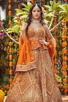 Shop_Asra_Orange Raw Silk Embroidered Bead Work Sweetheart Neck Peplum Choli Lehenga Set _Online_at_Aza_Fashions