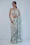 Buy_Amit Sachdeva_Ivory Georgette Printed Floral Halter V Neck Saree With Bralette _at_Aza_Fashions