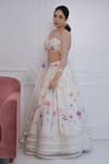 Amit Sachdeva_Ivory Net Printed Floral V Neck Tiered Lehenga Set _Online_at_Aza_Fashions