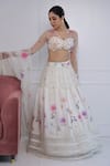 Shop_Amit Sachdeva_Ivory Net Printed Floral V Neck Tiered Lehenga Set _Online_at_Aza_Fashions