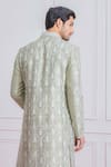 Shop_Ankit V Kapoor_Green Raw Silk Embroidered Sherwani Set_at_Aza_Fashions