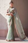 Buy Sahil Kochhar Green Organza Blouse Raw U Neck Ayaana Saree Set at Aza Fashions Buy_Sahil Kochhar_Green Organza Blouse Raw U Neck Ayaana Saree Set _at_Aza_Fashions