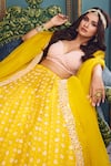 MADZIN_Yellow Organza And Georgette Embroidered Sequins & Floral Lehenga Set_Online_at_Aza_Fashions