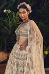 Buy_Tamanna Punjabi Kapoor_White Net V Neck Mirror Embellished Bridal Lehenga Set _Online_at_Aza_Fashions