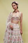 Shop_Tamanna Punjabi Kapoor_White Net V Neck Mirror Embellished Bridal Lehenga Set _Online_at_Aza_Fashions
