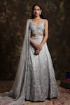 Buy_Niamh By Kriti_Silver Silk Organza Embroidered Sequins V Neck Cutdana Bridal Lehenga Set _at_Aza_Fashions