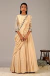 Buy_Nidhika Shekhar_Beige Georgette Crepe Silk; Lining: Shantoon Ruffle Draped Saree Gown For Women_at_Aza_Fashions