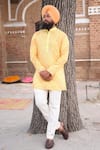 Buy_Nitesh Singh Chauhan_Yellow Cotton Silk Bandhani Print Kurta Pyjama Set_at_Aza_Fashions