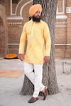 Shop_Nitesh Singh Chauhan_Yellow Cotton Silk Printed Bandhani Kurta Pyjama Set  _at_Aza_Fashions