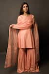 Buy_Jasmine Bains_Peach Twill Silk Scoop Neck Straight Kurta Gharara Set _at_Aza_Fashions