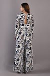 Shop_Bohame_Off White Crepe Printed Floral V Neck Dahlia Jumpsuit With Belt _at_Aza_Fashions