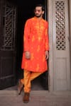 Shop_Nitesh Singh Chauhan_Orange Cotton Silk Embroidered Floral Motifs Kurta Set  _at_Aza_Fashions