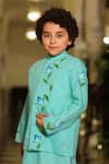Cute Couture_Blue Cotton Embroidery Turquoise Floral Bundi And Kurta Set _at_Aza_Fashions