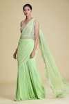 Buy_Cherie D_Green Silk, Tulle, Satin Sweetheart Neck Pre-draped Saree With Blouse _at_Aza_Fashions