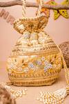 Buy NR By Nidhi Rathi Gold Embroidered Leilani Potli Bag at Aza Fashions Buy_NR By Nidhi Rathi_Gold Embroidered Leilani Potli Bag_at_Aza_Fashions