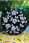 Buy_NR BY NIDHI RATHI_Black Hand Embroidered Scarlett Velvet Round Clutch _at_Aza_Fashions