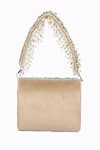 Shop_NR BY NIDHI RATHI_Beige Hand Embellished Mini Studded Flap Bag _at_Aza_Fashions