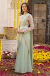 Buy_Chhavvi Aggarwal_Green Crepe Printed Floral Motifs Round Pre-draped Palazzo Saree Set _at_Aza_Fashions