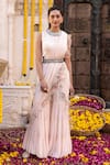 Buy_Chhavvi Aggarwal_Peach Georgette Printed Floral Motifs Round Pre-draped Sharara Saree Set_at_Aza_Fashions