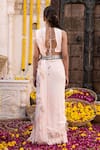 Shop_Chhavvi Aggarwal_Peach Georgette Printed Floral Motifs Round Pre-draped Sharara Saree Set_at_Aza_Fashions