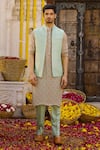 Chhavvi Aggarwal_Green Raw Silk Band Collar Bundi_Online_at_Aza_Fashions