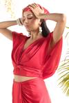 Shop_Chhavvi Aggarwal_Red Satin Plain Solid V Neck Draped Skirt Set _at_Aza_Fashions