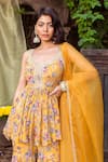 Shop_Chhavvi Aggarwal_Yellow Organza Scoop Neck Floral Print Kurta Sharara Set _Online_at_Aza_Fashions