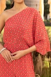 Chhavvi Aggarwal_Red Crepe Lining Shantoon Floral One Shoulder Jumpsuit _Online_at_Aza_Fashions