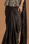 Shop_Sejal Kamdar_Black Pure Satin Crepe Print Ajrak Asymmetric Neck Peplum Saree Gown _Online_at_Aza_Fashions