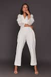 Deepika Arora_White Roma Embroidered Sequins V Neck Puff Sleeve Jumpsuit With Belt _Online_at_Aza_Fashions