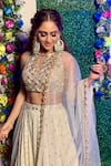 Aaryaa By Kashveen Kohli_White Georgette Thread And Mirror, Acrylic Round Embroidered Lehenga & Blouse Set _at_Aza_Fashions